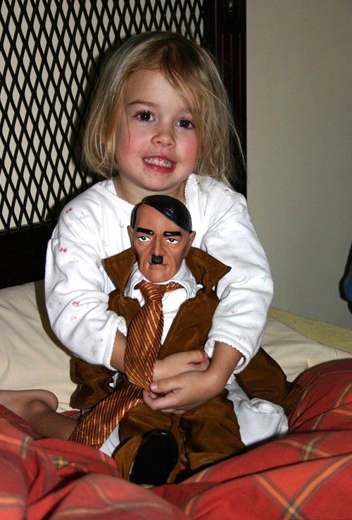 Girl with Hitler doll