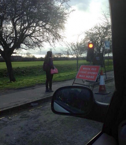 Girl at road block
