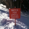 Watch for uphill skiers