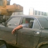 Big man, small car Big man, small car