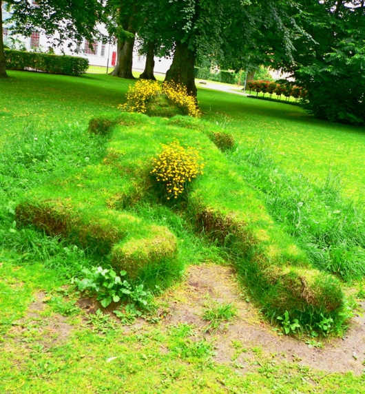 Naked woman landscaping