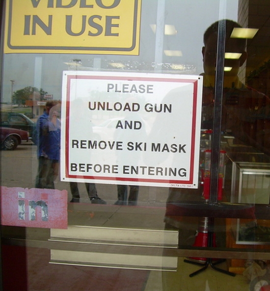 Unload gun and remove ski mask
